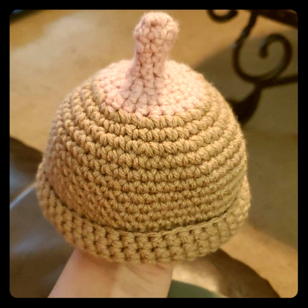 Nitted baby cap